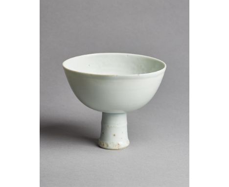 A fine Chinese Shufu-type moulded stem bowl, Yuan Dynasty (1279-1368), moulded on the wall of the interior with a band of scr