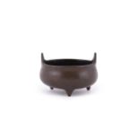 A Chinese bronze small tripod censer