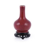 A small Chinese sang-de-boeuf vase