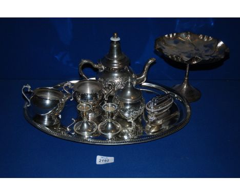 A quantity of plated and white metal items including Milk Jug, Sugar Bowl, candlesticks, teaspoon, Table Lighter, Comport, tr