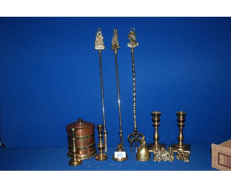 A quantity of brass including Candlesticks, Toasting Fork, Pokers, copper Tea Caddy, etc.