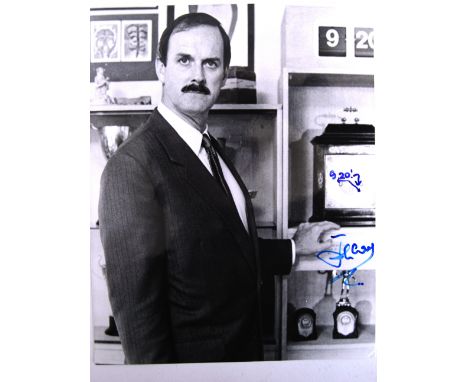 JOHN CLEESE: An original 8x10" black and white publicity film still from the film Clockwise, depicting Cleese in character. N