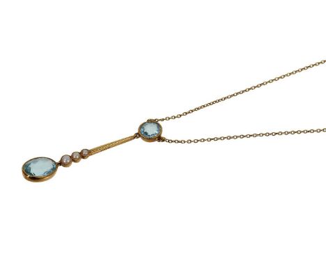 Edwardian aquamarine and seed pearl pendant necklace with oval and round mixed cut aquamarines in 15ct gold setting on trace 