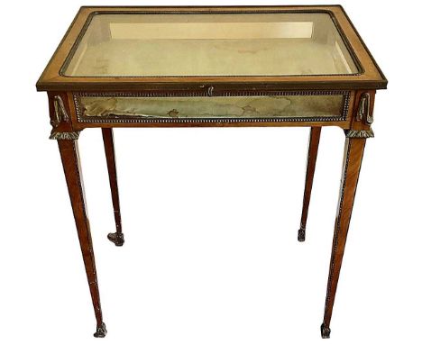 19th century Continental walnut glazed bijouterie table, with hinged top on ormolu mounted tapered legs, 66cm wide x 45cm dee