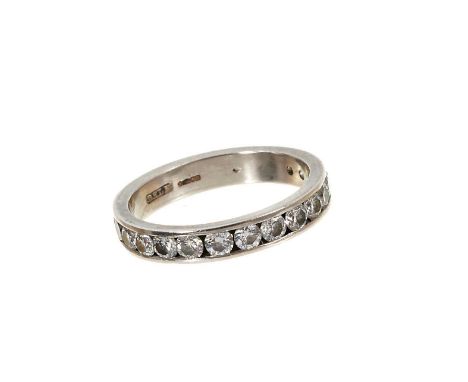 Diamond eternity ring with brilliant cut diamonds in platinum channel setting, estimated total diamond weight approximately 1