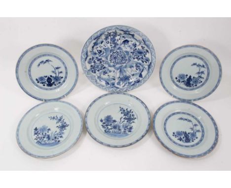 Set of five 18th century blue and white Chinese dishes, decorated with rockwork and peonies, and one other Chinese Kangxi-sty