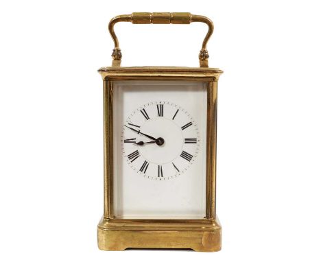 French brass carriage clock with white enamel dial in brass case, 17cm high.Good afternoon, the number on the backplate is 55