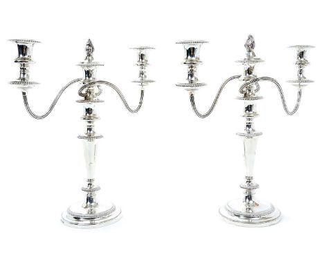 Pair 1930s silver three light candelabra, with tapering stems and gadrooned borders, separate twin branch reeded arms, sconce