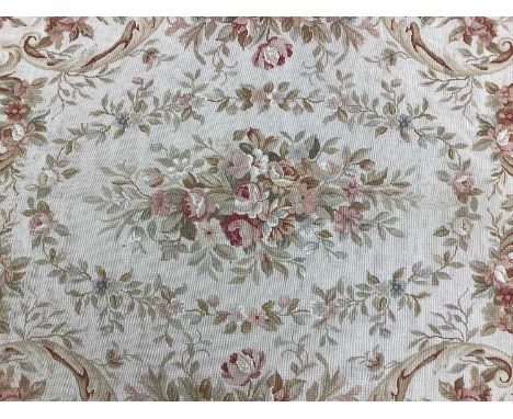 Aubusson style tapestry carpet, embroidered with a formal floral design in muted tones, approximately 290 x 200cm