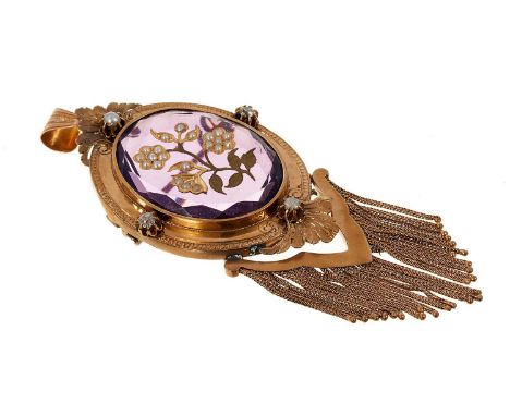 Victorian amethyst and gold tassel pendant brooch, the oval amethyst plaque with intaglio engraved decoration with seed pearl