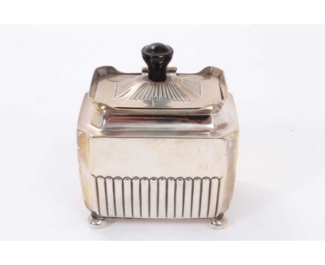 Victorian silver tea caddy of half fluted, rectangular form, with upstanding rim and domed cover, on four bun feet (Sheffield