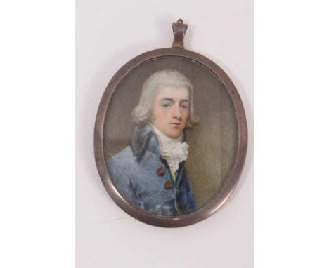 A portrait miniature of a young man, in blue coat and white cravat, oval, 7.5 x 5.3cm, silver and guilloché enamelled frame, 