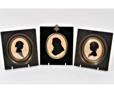 Regency papercut silhouette miniature of a gentleman, in papier mâché frame, total size 14 x 12cm and pair of portrait miniat