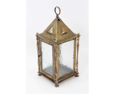 Arts &amp; Crafts brass hanging lantern, with suspension loop and mottled glass panels, between projecting slender knopped co