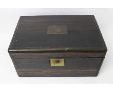 Victorian coromandel writing slope, with fitted interior interior and engraved brass plaque to the hinged cover, push button 