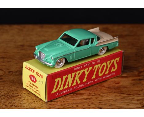 Dinky Toys 169 Studebaker Golden Hawk with windows, light green body with cream rear panel and sides, chrome spun hubs with w