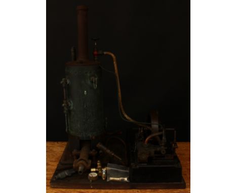 A mid-20th century partially scratch built model of a donkey engine, gas fitting, fitted with a 5" single flywheel, displayed