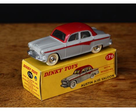 Dinky Toys 176 Austin A105 saloon with windows, pale grey body with red roof and red side flashes, chrome spun hubs with whit