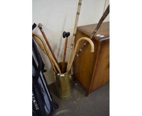 BRASS STICK STAND AND VARIOUS WALKING STICKS