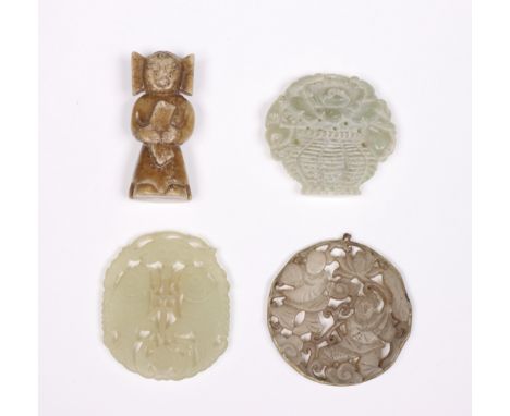China, four jade and stone carvings, comprising three openworked plaques, one with twin fish, one with boys and one with flow