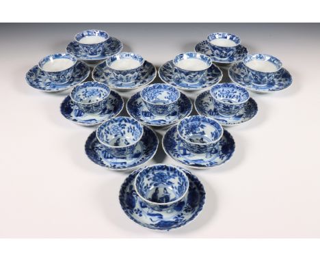 China, two sets of blue and white porcelain cups and saucers, 18th century, comprising a set of six moulded cups and saucers 