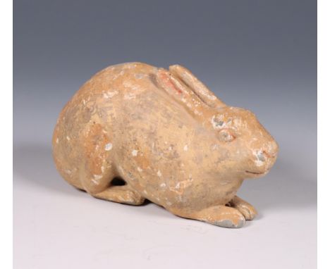 China, earthenware model of a rabbit, probably Tang dynasty (618-907), realistically modelled in crouching position, with tra