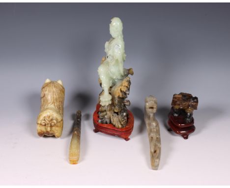 China, various jade, jadeite and hardstone carvings, modern, comprising a Guanyin on rockwork, a lion, an elephant and two be