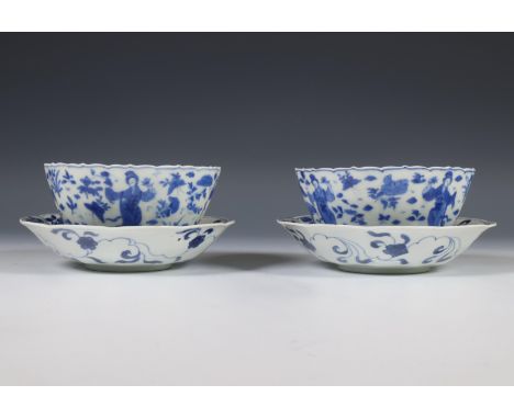 China, pair of blue and white porcelain fluted bowls and a pair of saucers, 19th/ 20th century, the bowls and saucers various