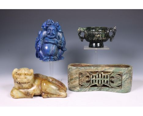 China, four stone carvings, modern, comprising a jade lion, a lapis lazuli Budai, a soapstone holder and a soapstone censer h