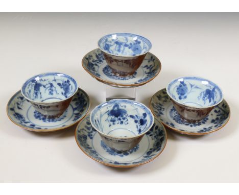 China, set of four blue and white and café-au-lait-glazed cups and saucers, Qianlong period (1736-1795), each painted to the 
