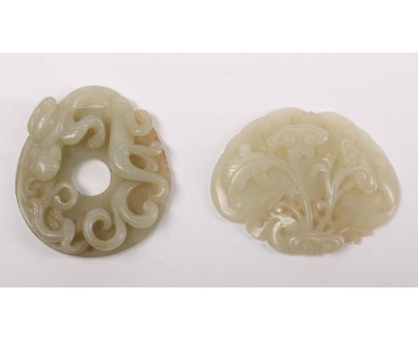China, two jade carvings, 19th/20th century, one carved with a chilong and the other with lingzhi fungus, both stones of a pa