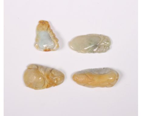 China, four jade and jadeite carvings, each variously carved as a gourd, the stones of a pale green and russet tones l. 3,5-5