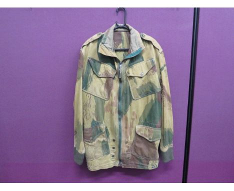 1959 Pattern Airborne Denison Smock green, tan and brown camouflaged smock.  Full front zip.  Patch chest and lower pockets, 