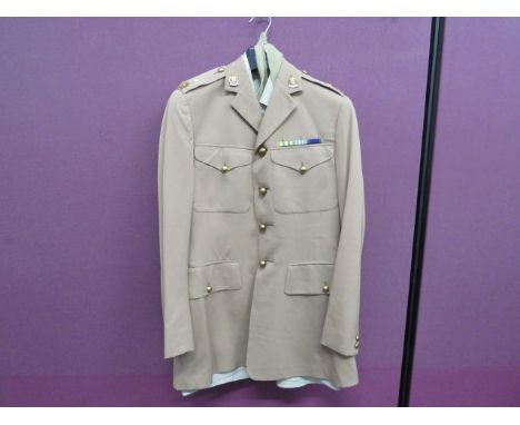 Queens Royal Irish Hussars Officer's Tropical Service Dress Uniform light khaki, single breasted, open collar tunic.  Patch c