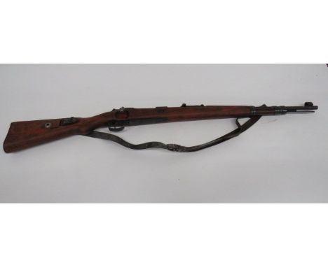 Deactivated WW2 Yugoslavian Contract Mauser K98 Rifle 24 inch 7.92 mm blued barrel.  Hooded rear sight.  Rear ladder sight.  