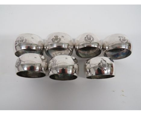 Seven Royal Air Force Mess Napkin Rings silvered napkin rings.  The front with engraved KC RAF crest.  Stamped with maker 'M 
