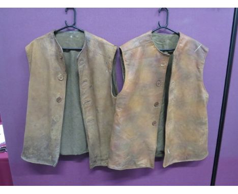 Two British WW2 Leather Jerkins brown leather, sleeveless jerkins.  Bakelite button front fastening.  Khaki blanket lining.  