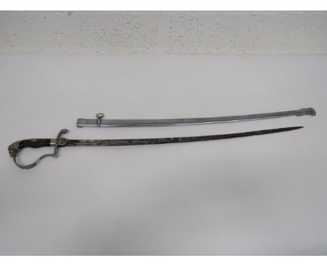 Imperial German Cavalry Officer's Sword 32 1/2 inch, single edged, slightly curved blade with large fuller.  White metal stir