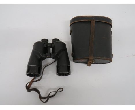 Pair of 1944 Dated Canadian Naval Binoculars black crinkle pattern body.  Darkened end mounts.  The top marked 'CGB 40 MA 7 x