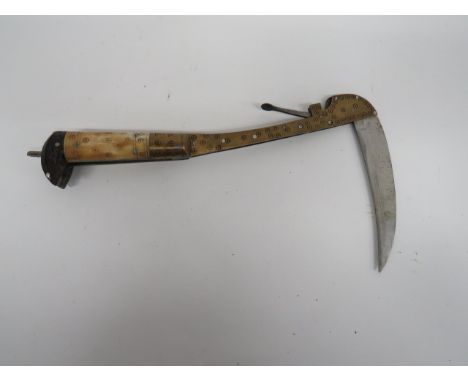 Early 20th Century Indian Folding Crow Bill Axe single edged, slightly curved, folding blade.  Blade folding into its brass h