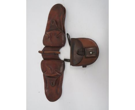 Pair of Officer's Saddle Wallets and Horseshoe Case tan leather pockets.  Top flaps secured by brass studs.  Central leather 