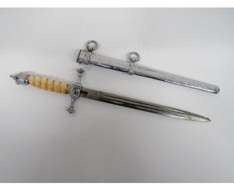 Imperial German M1892 Naval Officer's Dagger 9 1/2 inch, double edged blade with two narrow fullers.  Chrome plated crossguar