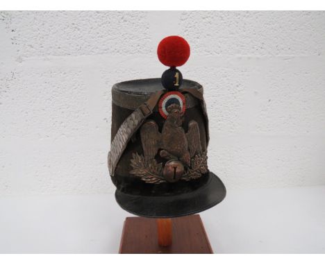 19th Century French 1st Regiment Shako black patent leather crown.  Black beaver skin body with bullion braid top edging.  Bl