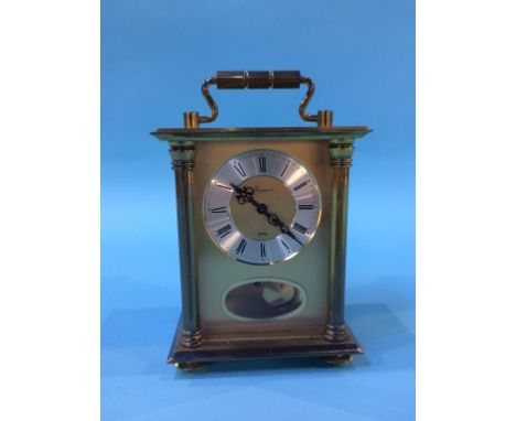 A brass carriage clock
