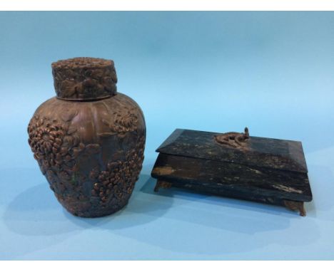 An Onyx box and an Oriental cast metal tea caddy