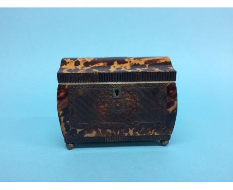 A Georgian tortoiseshell tea caddy,16cm wide, 8.5cm deep, 12cm high