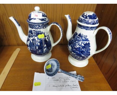 TWO BLUE AND WHITE POTTERY COFFEE POTS (A/F), WITH A POTTERY LADLE