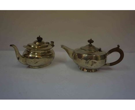 Two Silver Teapots, Hallmarks for Birmingham 1922 and 1926, one teapot is melon shaped, the other has the handle lacking, ove