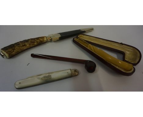 Mixed Lot of Collectables, to include a Scottish skean dhu, red glass opium pipe, twisted glass opium pipe with case, and a s