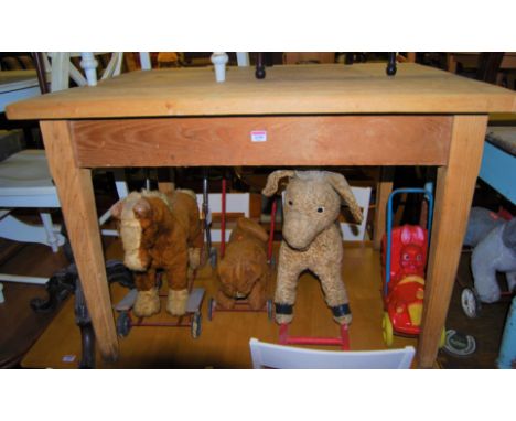 A light elm plank top farmhouse kitchen table, having opposing end drawers on tapering supports, length 106cm